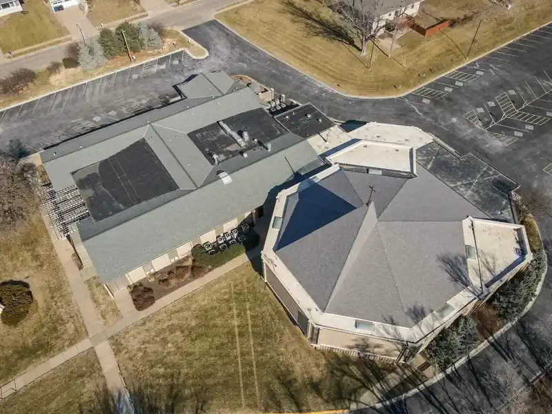 Church Campus Restoration in Bellevue, NE — commercial roofing project by Royalty Roofing and Siding